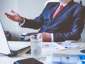 realtor in meeting with real estate investors