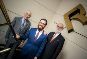 Smiling Businessmen in Suits